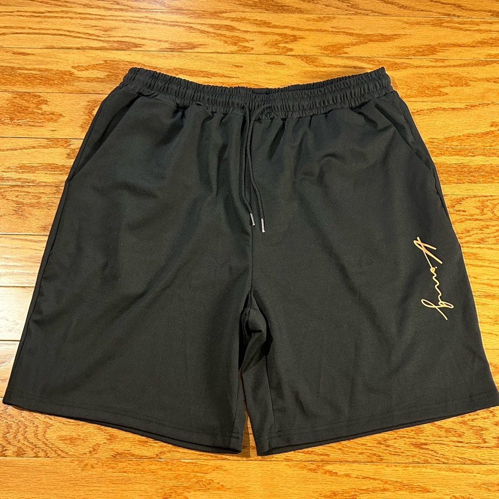 Black Shorts with Gold Logo